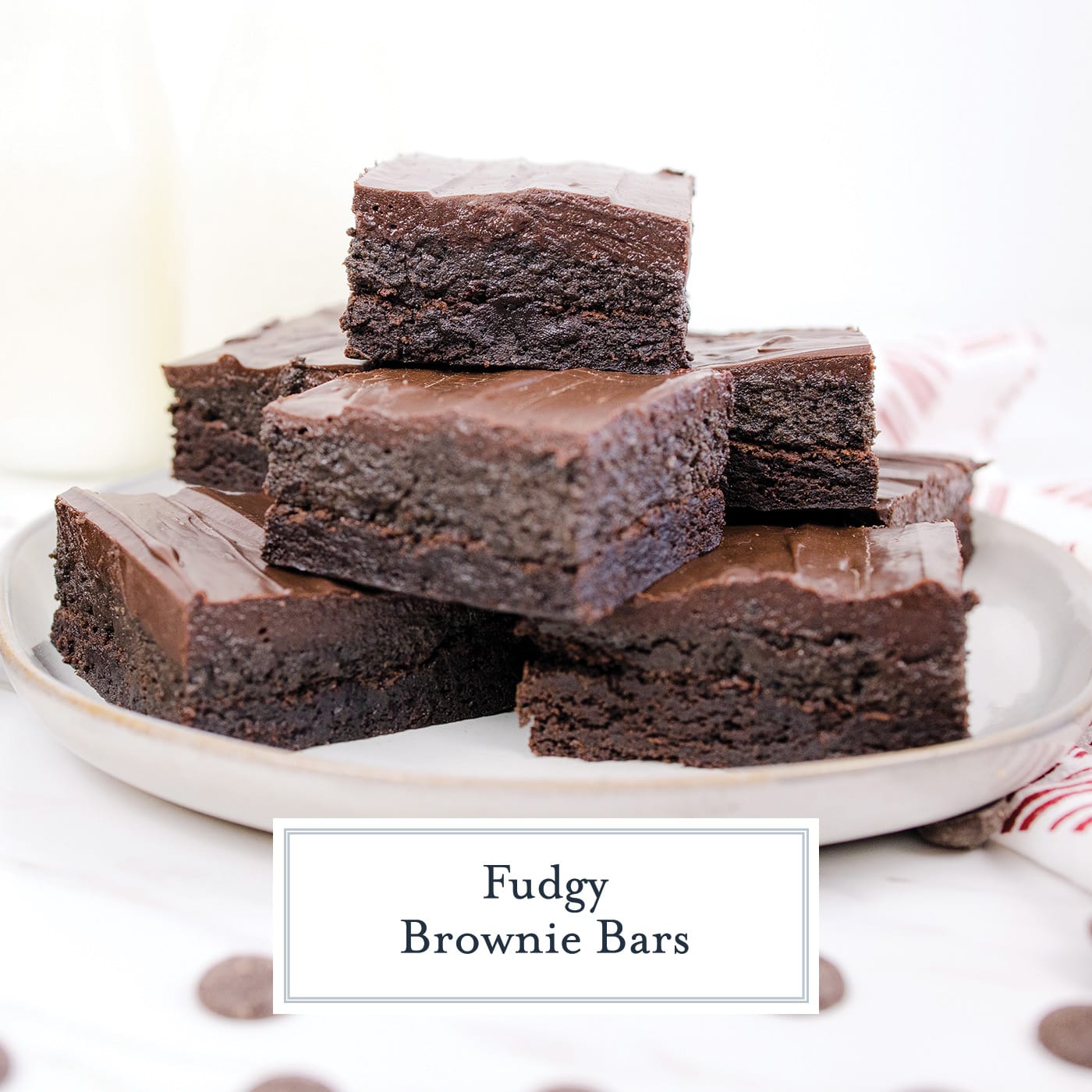 straight on shot of stack of brownies on a plate with text overlay for facebook
