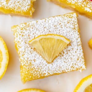 overhead shot of lemon bar slice topped with lemon