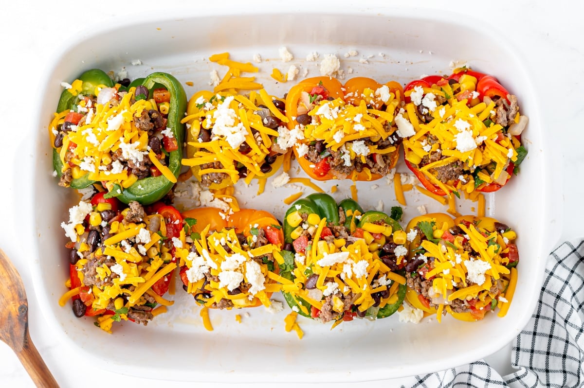 mexican stuffed peppers topped with cheese