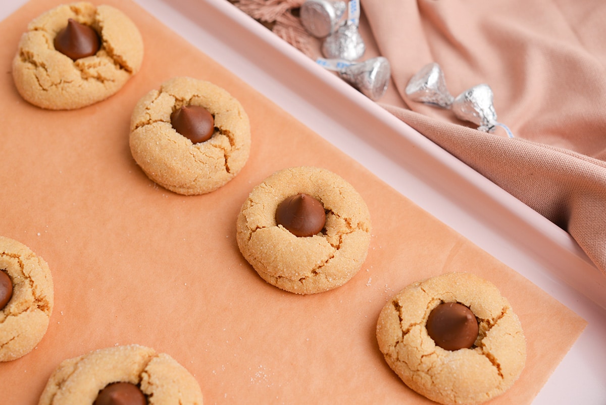 peanut butter blossoms on a baking sheet