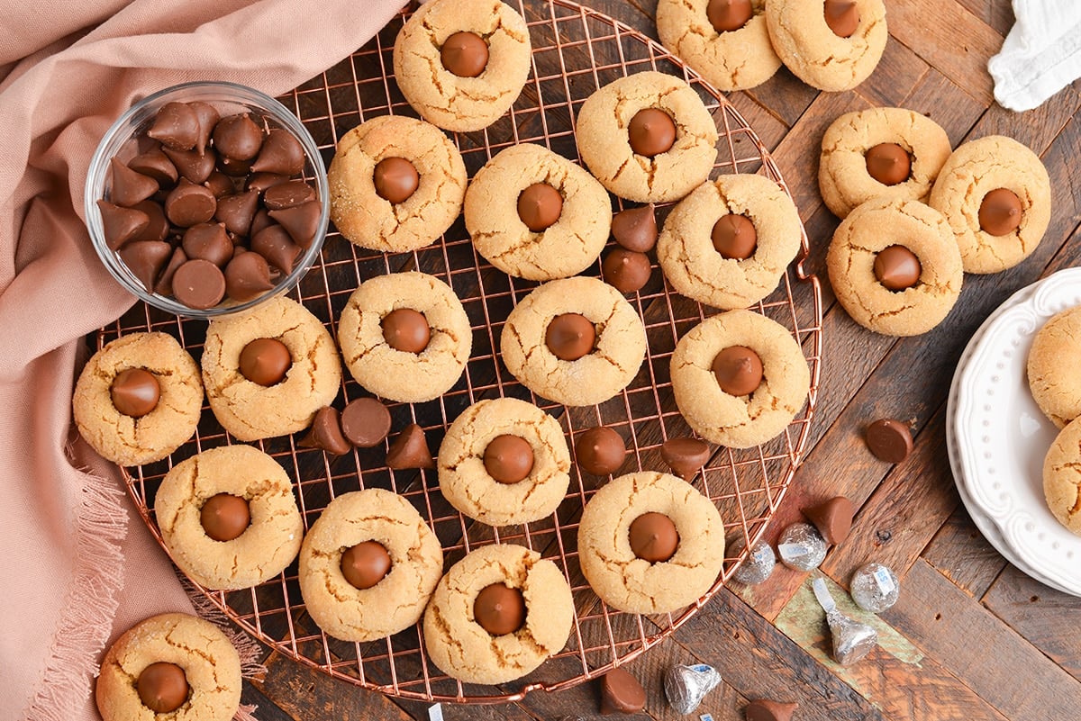 overhead shot of peanut butter blossoms on a cooling rack