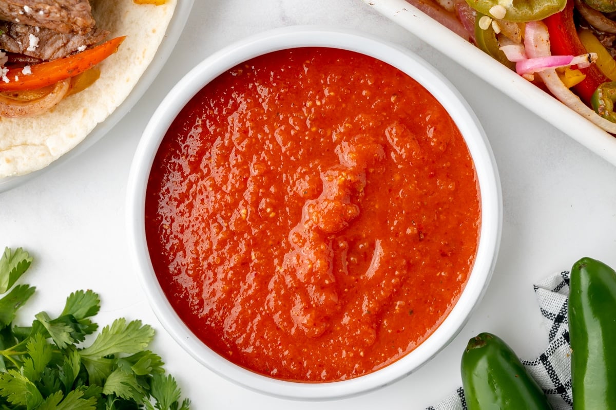 overhead shot of bowl of red sauce