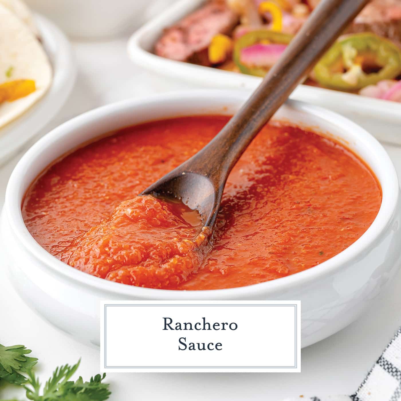 angled shot of spoon in bowl of ranchero sauce with text overlay for facebook