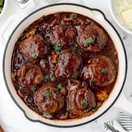 overhead shot of salisbury steaks in a skillet