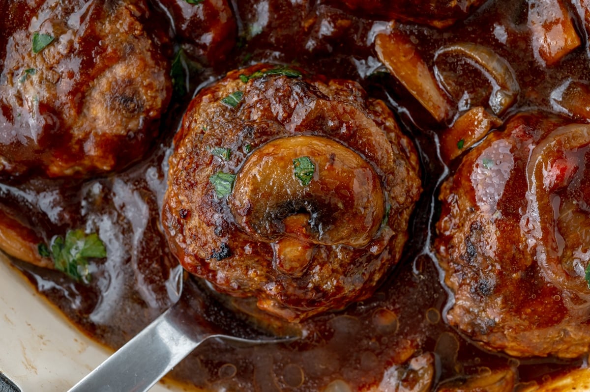 salisbury steak on a serving spoon