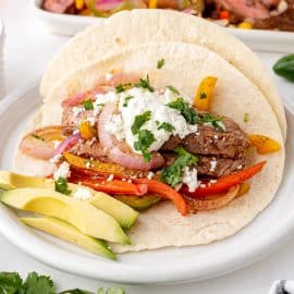 angled shot of plate of steak fajitas