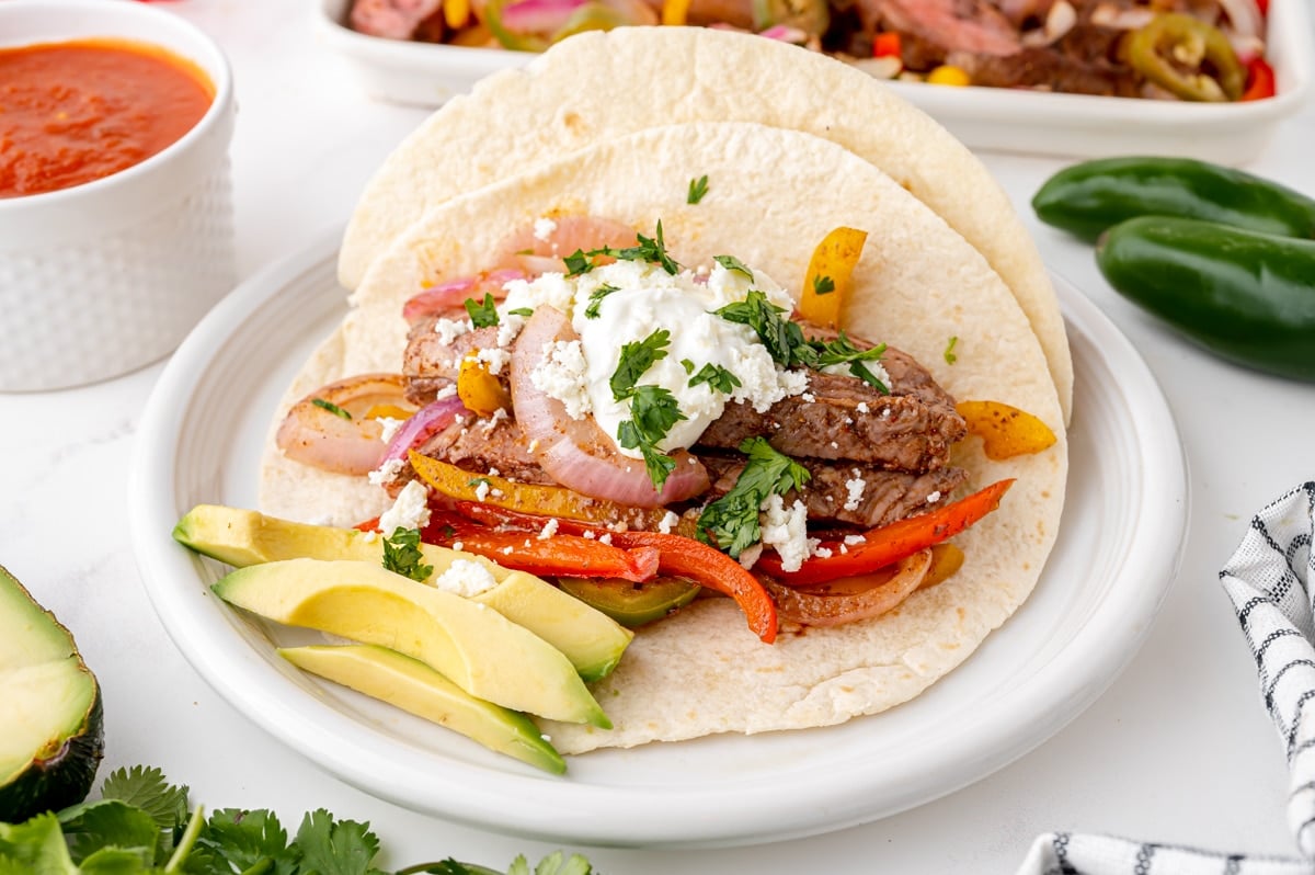 angled shot of plate of steak fajitas