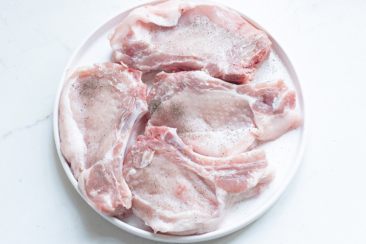 seasoned pork chops on a plate