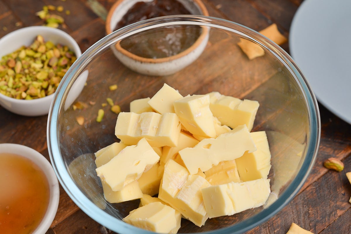 close up of bowl with chopped brie cheese