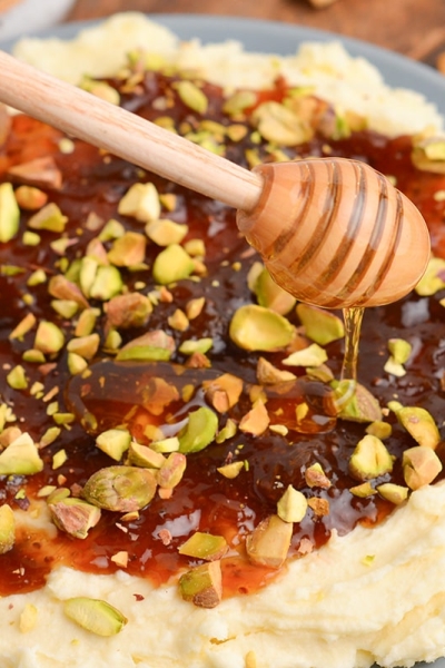 honey drizzled on whipped brie dip