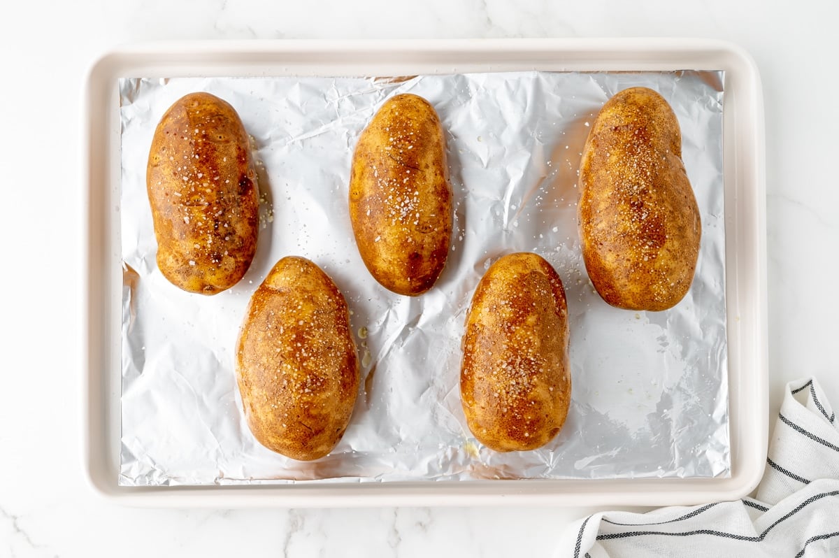 potatoes on sheet pan topped with salt