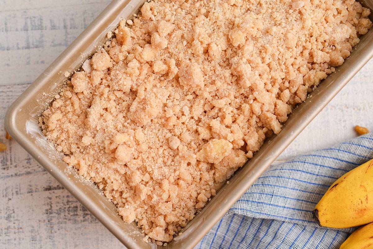 close up of streusel topping in a loaf pan