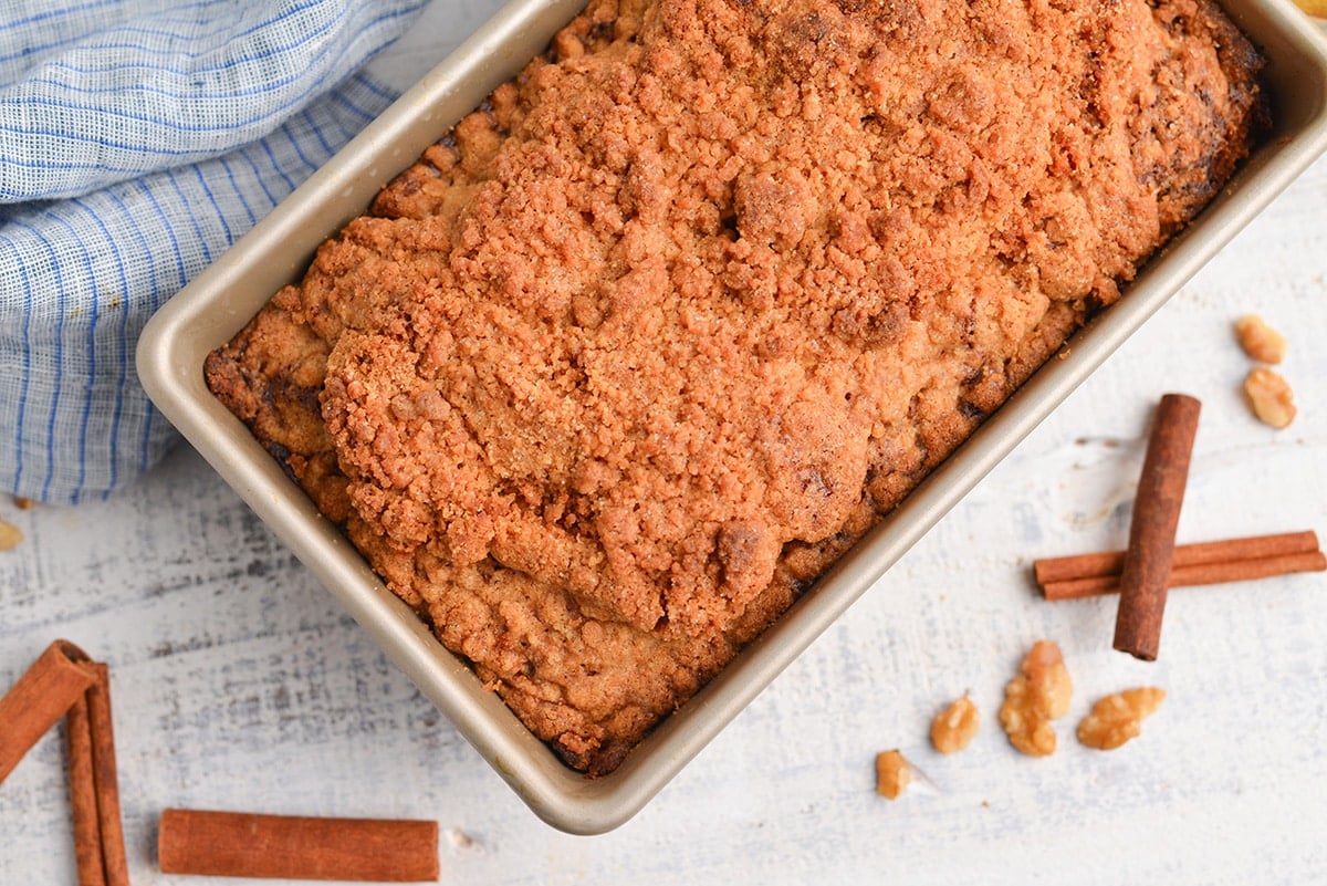 close up corner of streusel on bread in bread pan