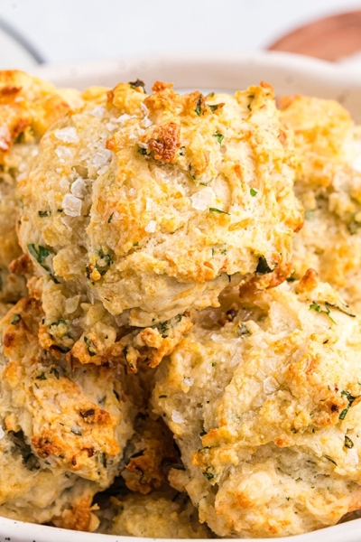 angled shot of basket of biscuits