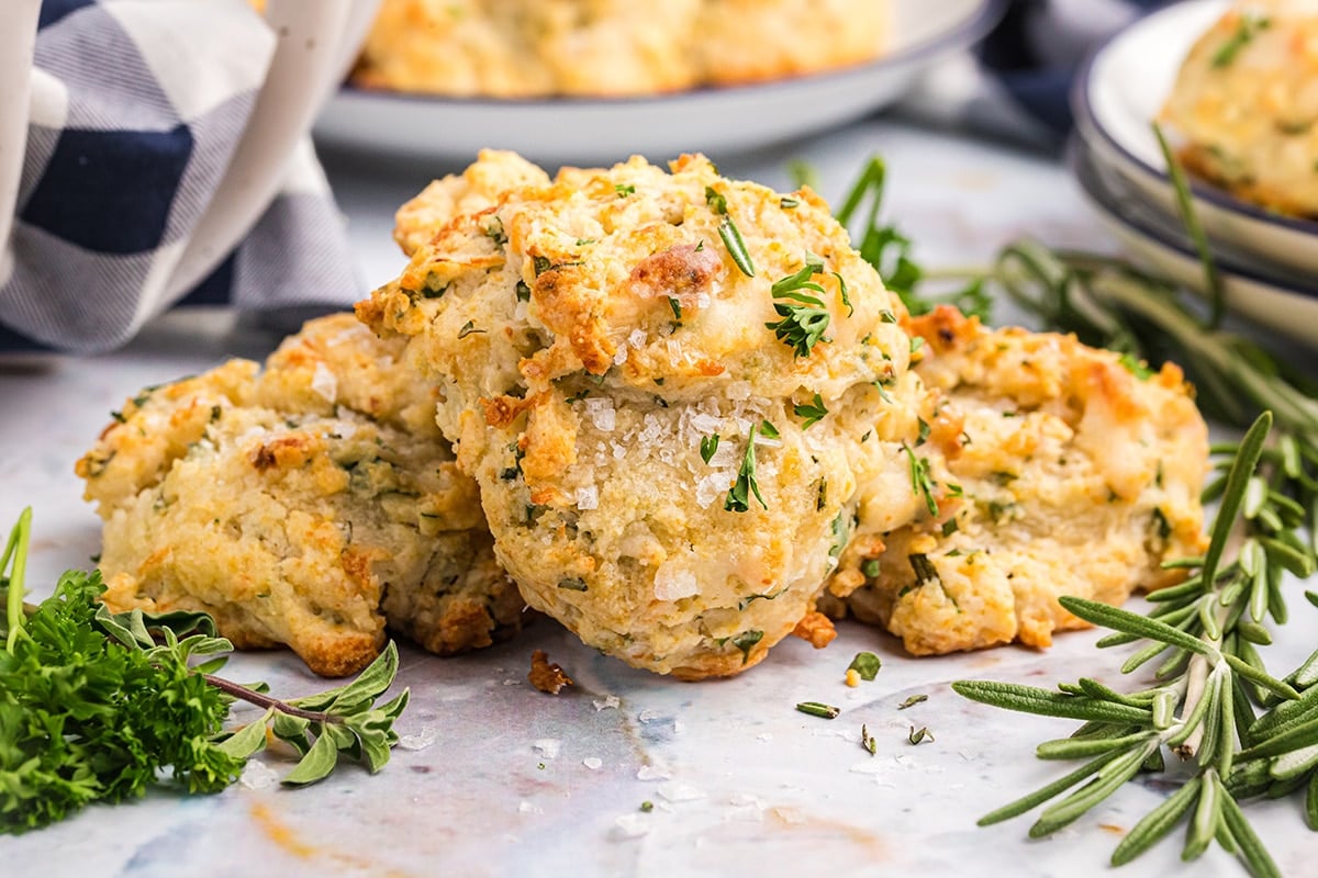 close up of pile of cheesy herb biscuits