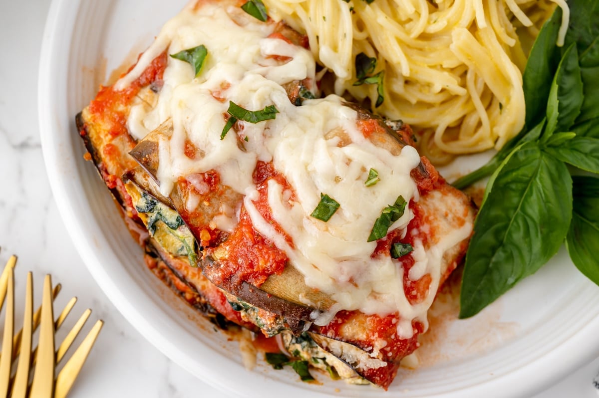 close up overhead shot of eggplant rollatini on a plate