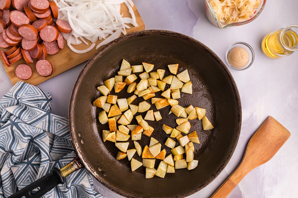 potatoes cooking in a pan