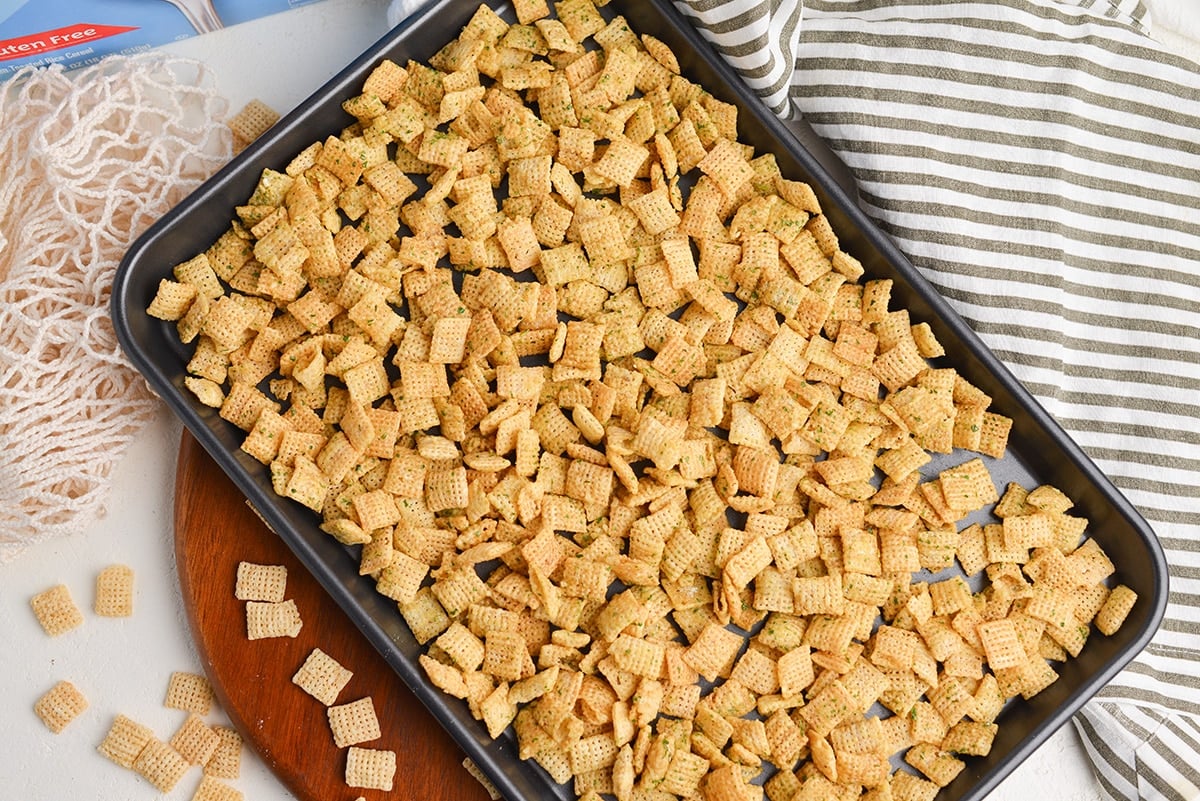 chex sprinkled with ranch on a sheet pan