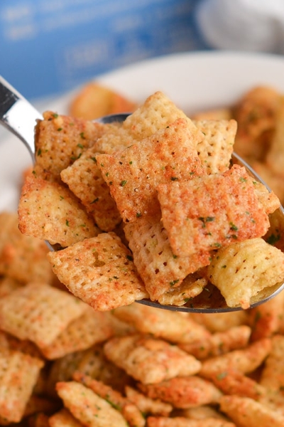 close up of spoon full of ranch chex mix
