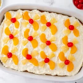 overhead shot of sunshine cake in a pan turned on an angle