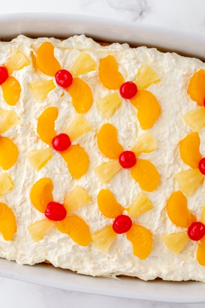 overhead shot of sunshine cake in a pan turned on an angle