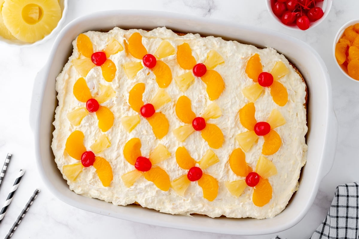 overhead shot of sunshine cake in a pan turned on an angle