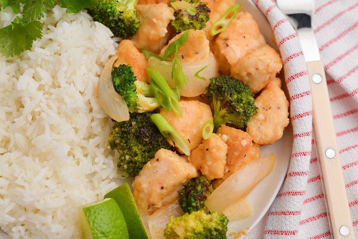 close up of chicken and broccoli on a plate