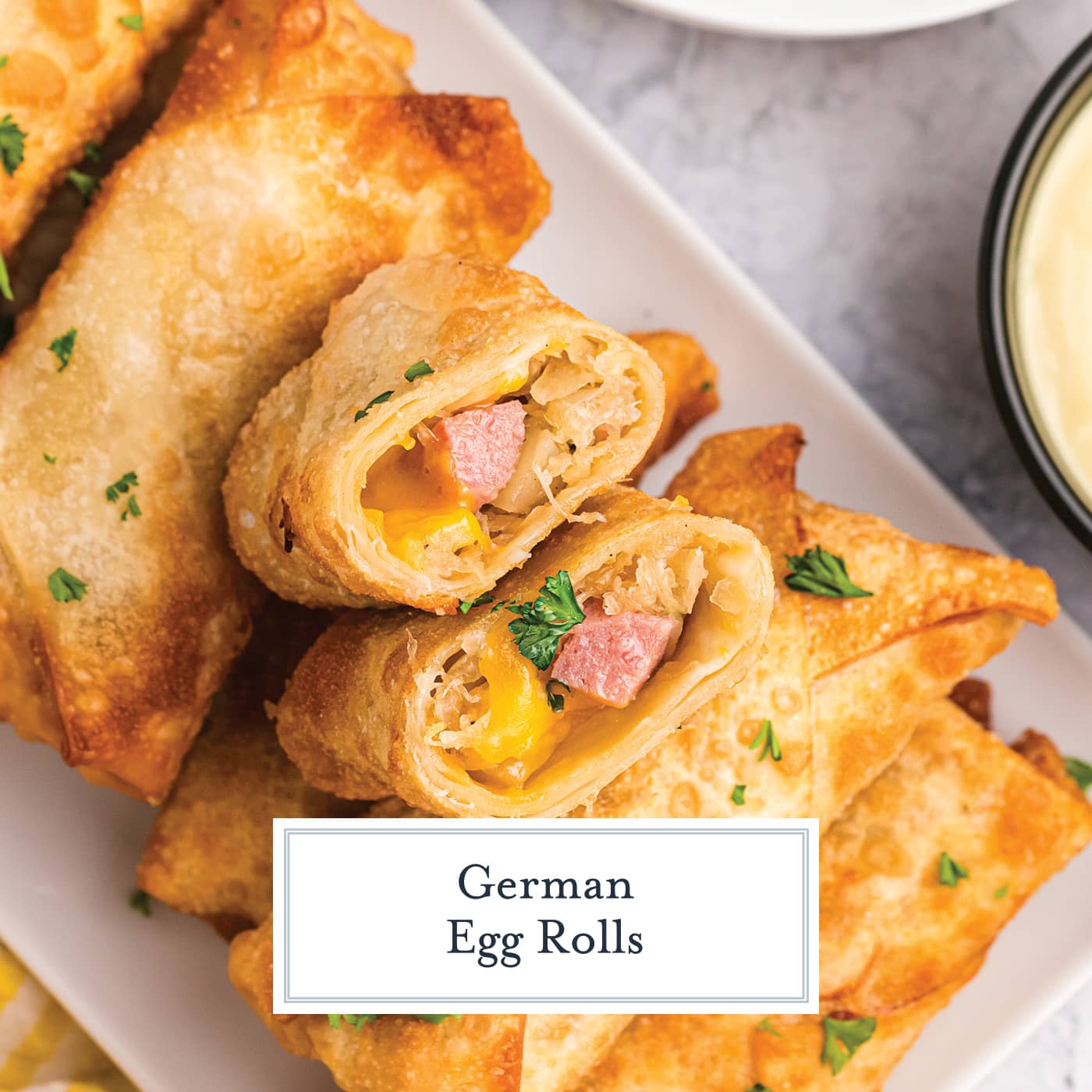 overhead shot of plate of german egg rolls with text overlay for facebook
