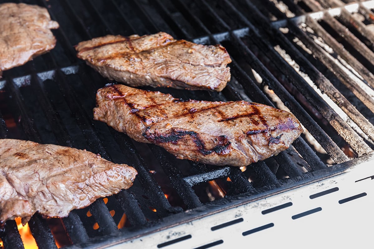 steak cooking on grill