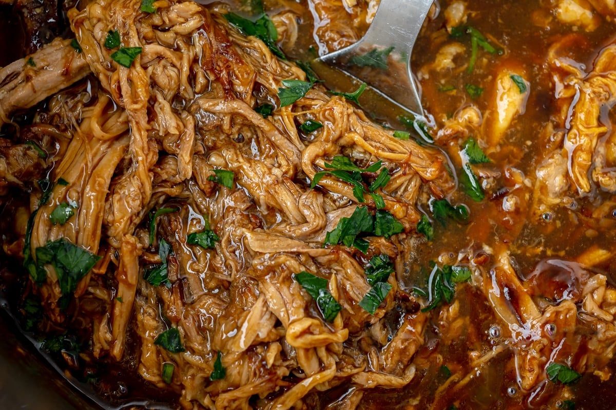 close up of pulled pork in an instant pot