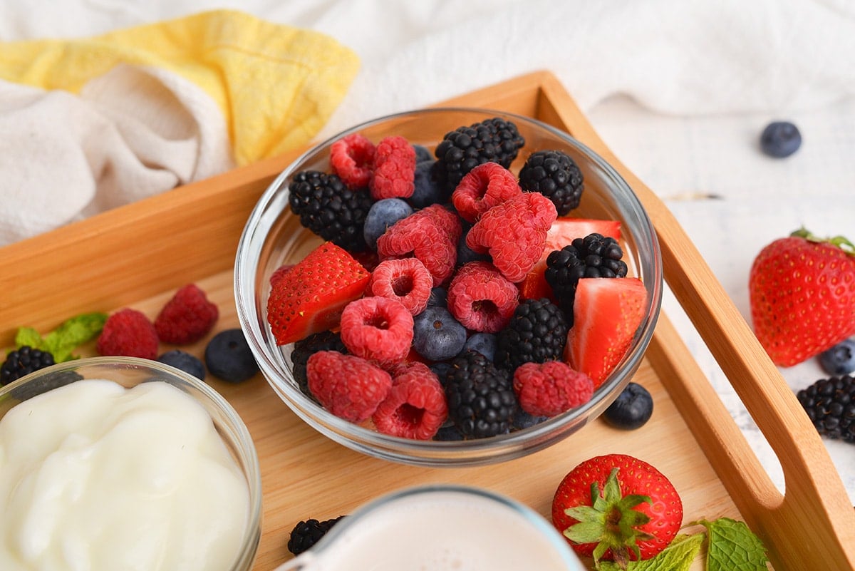 angled shot of berries in a bowl