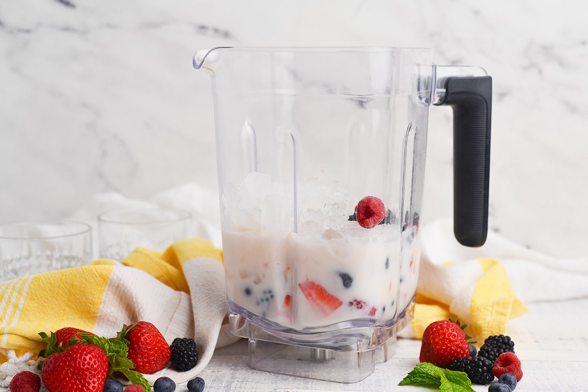 straight on shot of smoothie ingredients in a blender