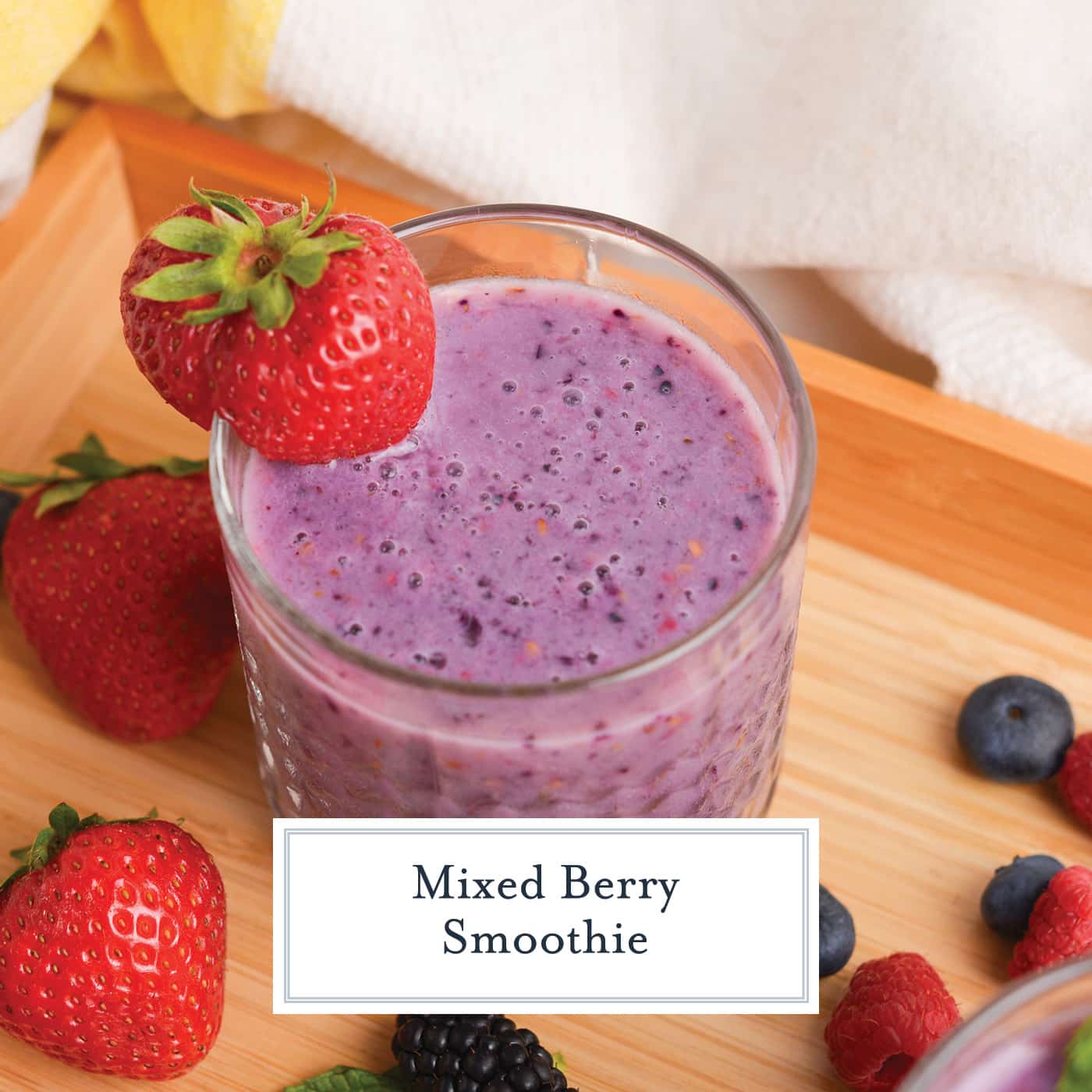 angled shot of berry smoothie with text overlay for facebook