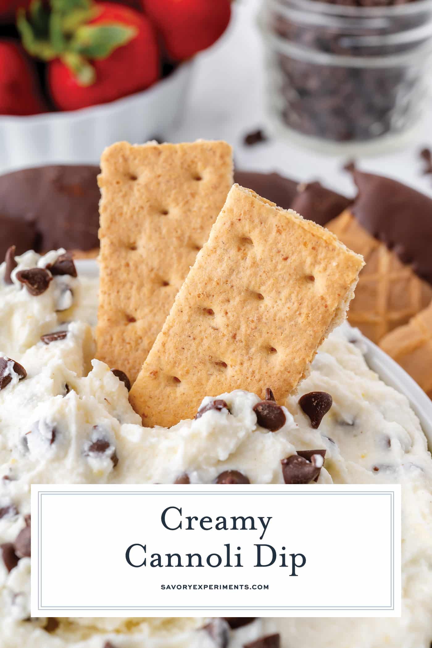 graham crackers in cannoli dip with text overlay for pinterest