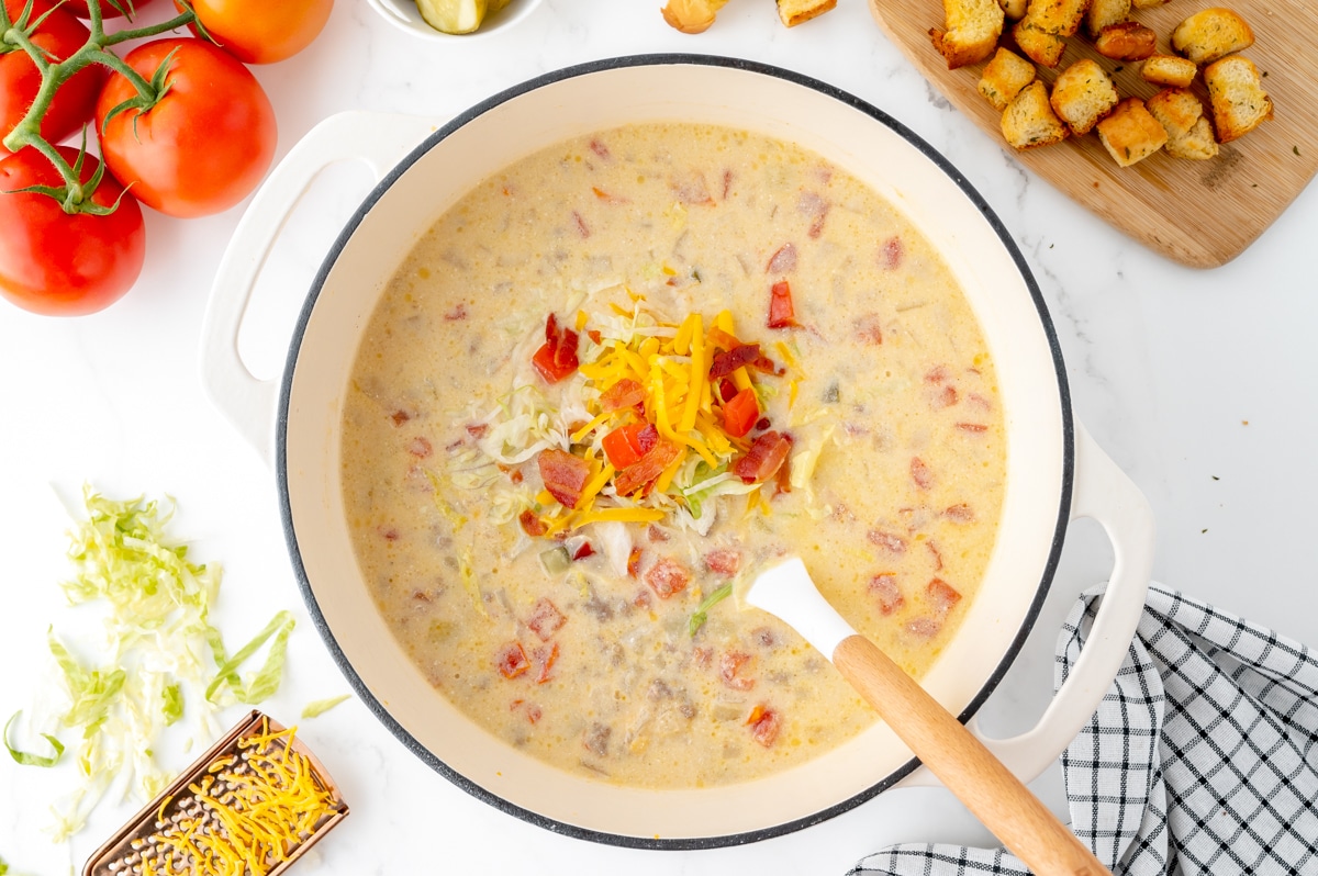 toppings in pot of cheeseburger soup