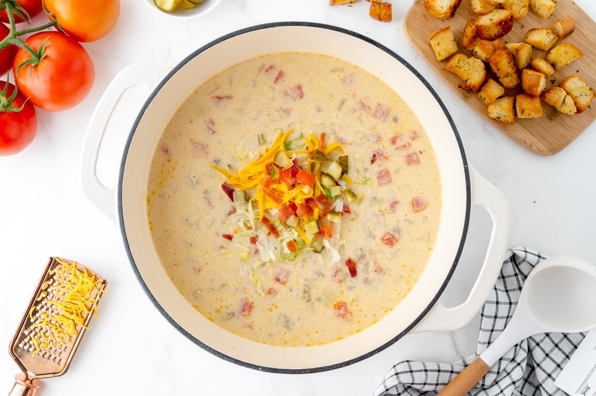 toppings in pot of cheeseburger soup