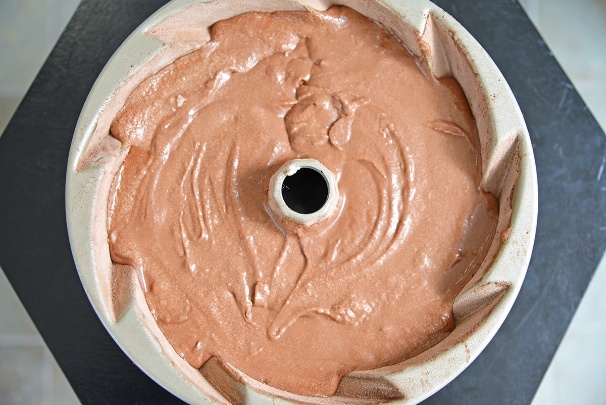 overhead of chocolate cake mix in a swirl bundt pan