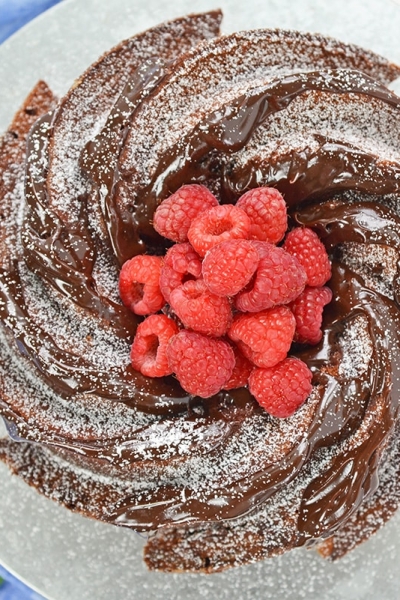 overhead of a chocolate bundt cake recipe with fresh berries