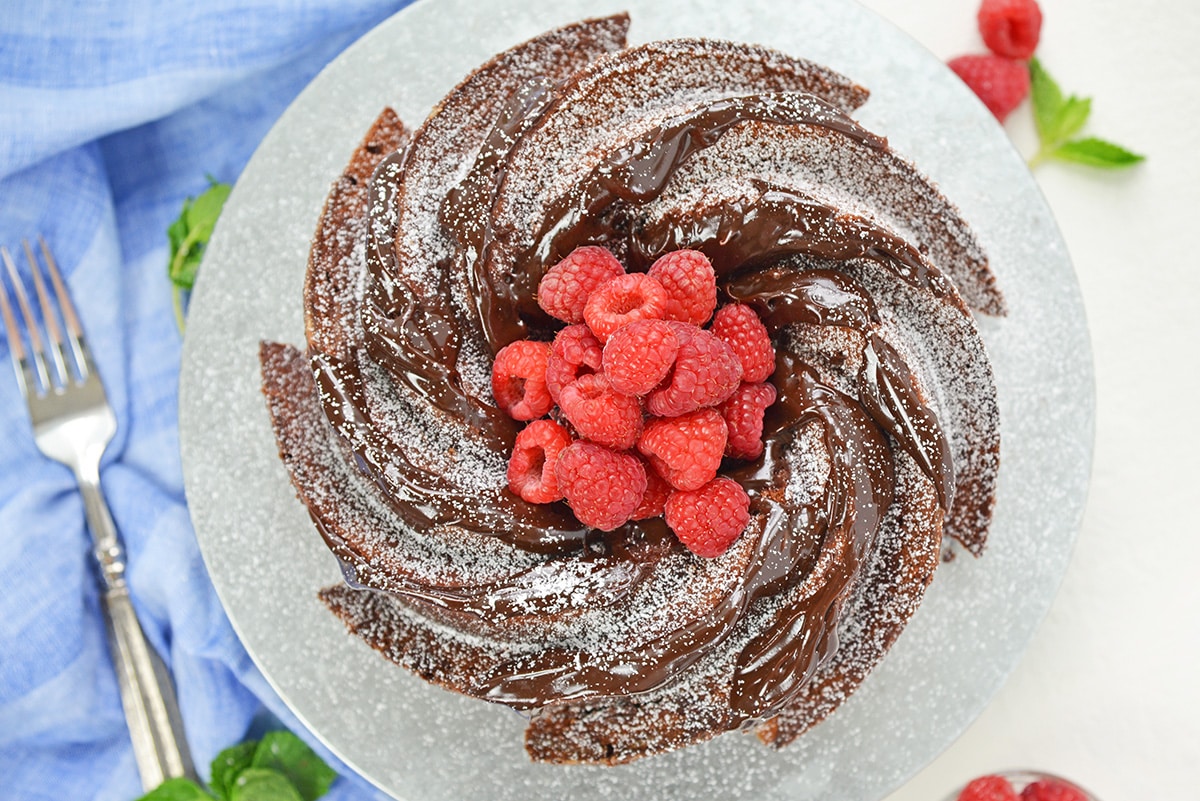 overhead of a chocolate bundt cake recipe with fresh berries