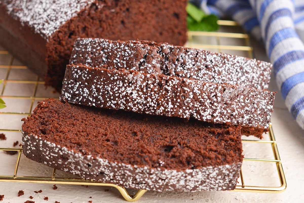 slices of chocolate cake dusted with powdered sugar