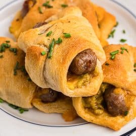 close up of a sausage link in crescent dough