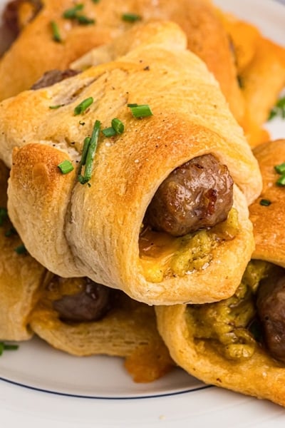 close up of a sausage link in crescent dough