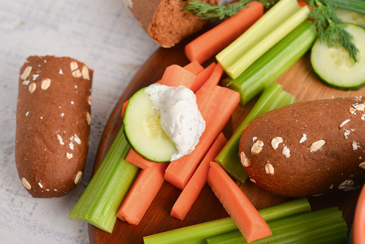 cucumber with dill dip on it