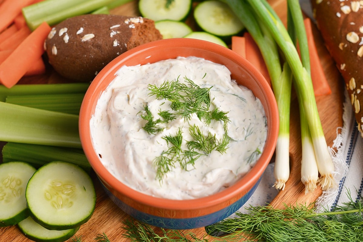 angled shot of bowl of dip