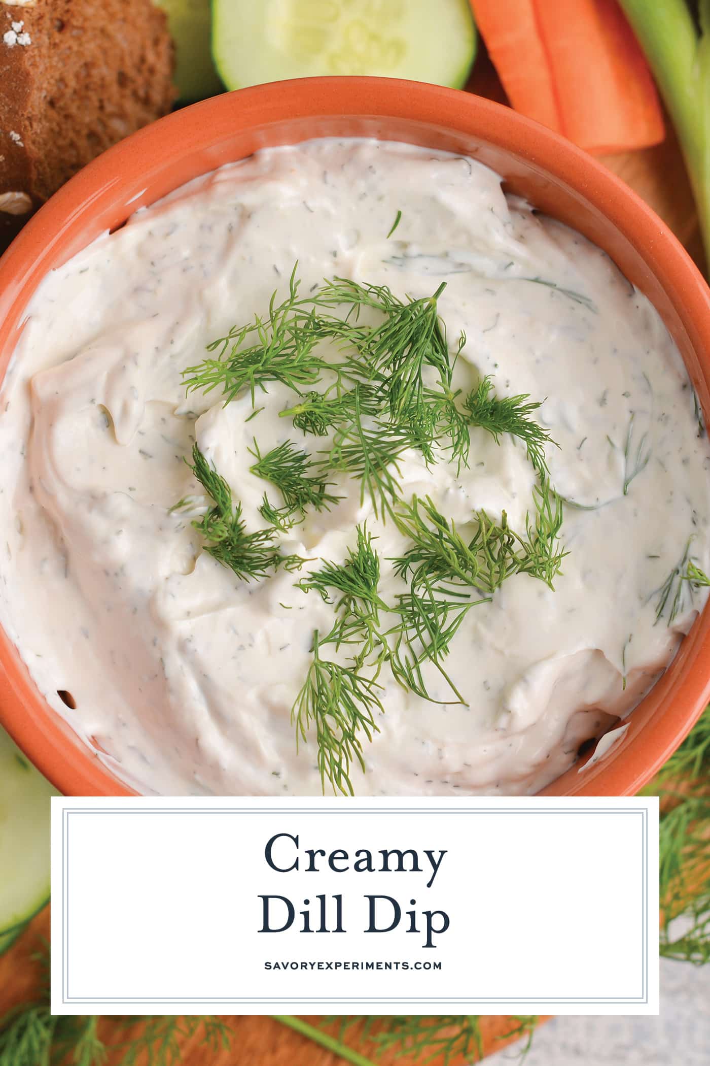 overhead shot of bowl of dill dip with text overlay for pinterest
