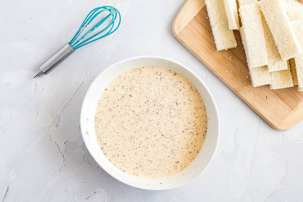 bowl of french toast sticks custard