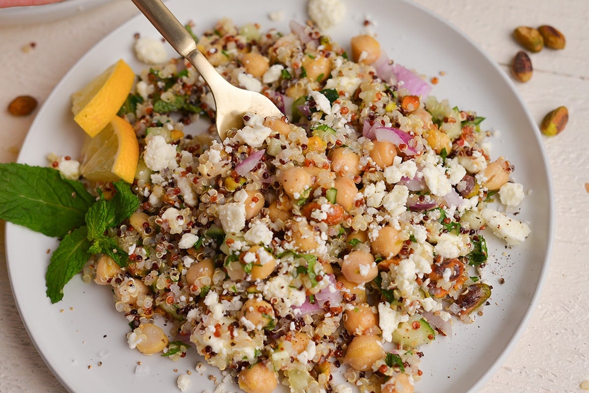 close up overhead shot of fork in jennifer aniston salad