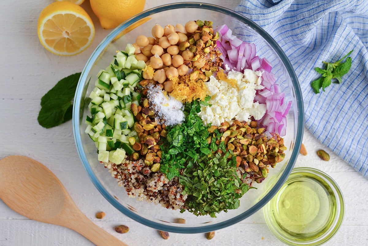 overhead shot of quinoa salad ingredients in bowl