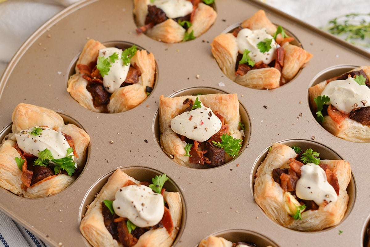 baked wellingtons in a muffin tin