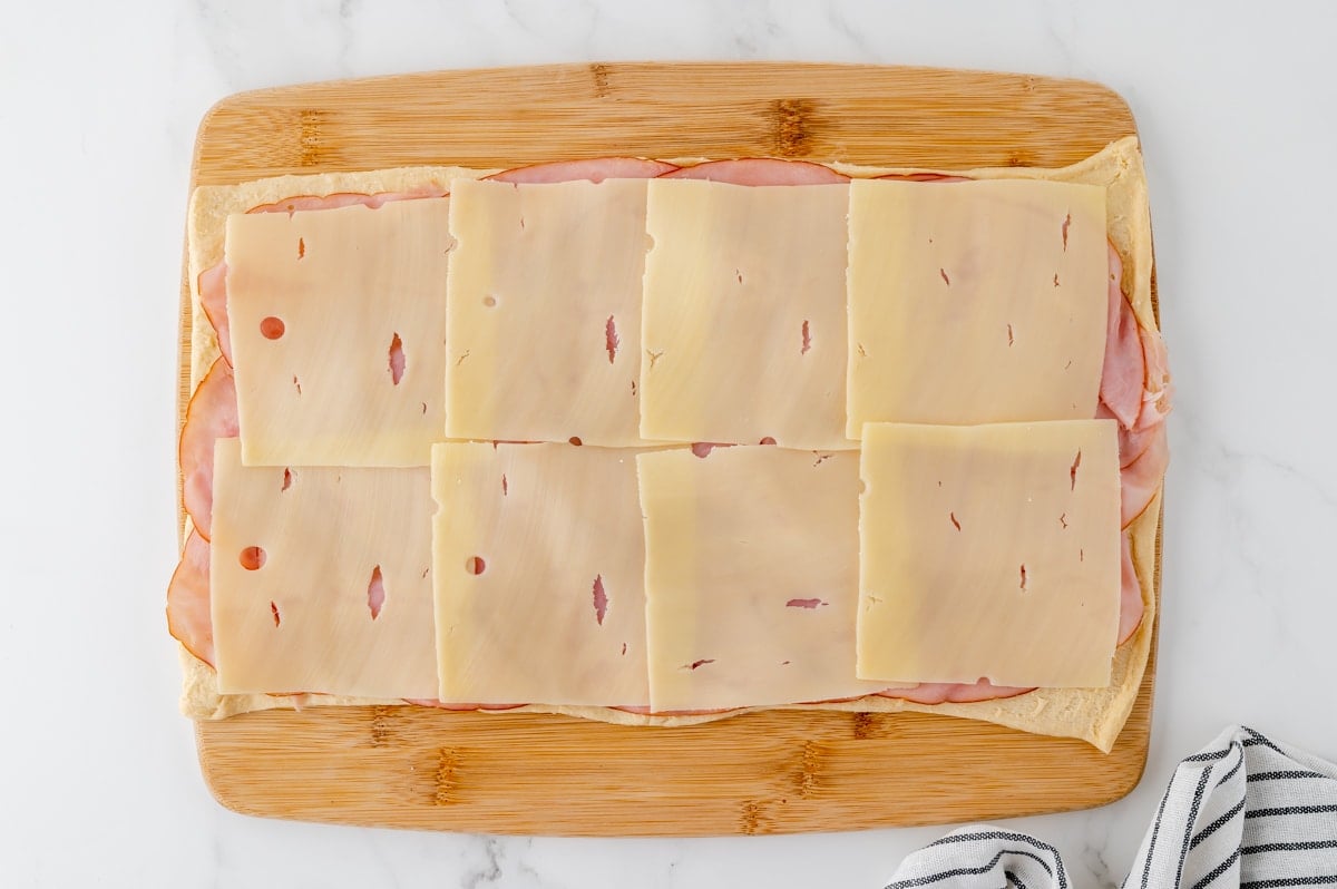 swiss cheese on ham slices